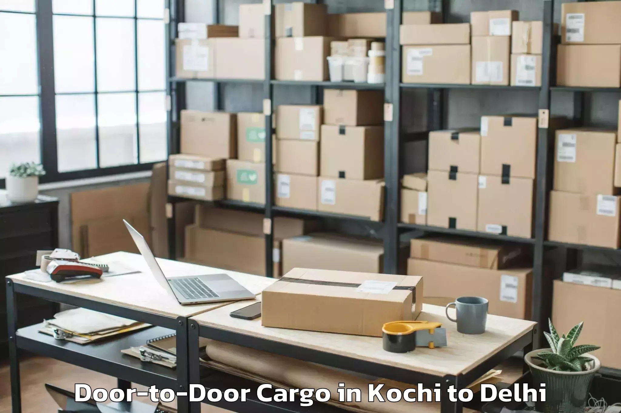 Top Kochi to Jamia Hamdard New Delhi Door To Door Cargo Available